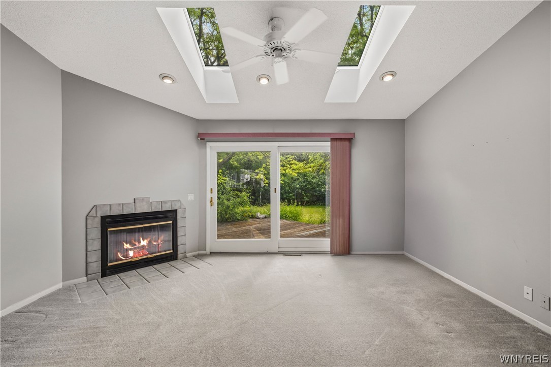 3231-3233 Military Road Niagara, NY 14304 - Photo 10 of 37 living room with skylight