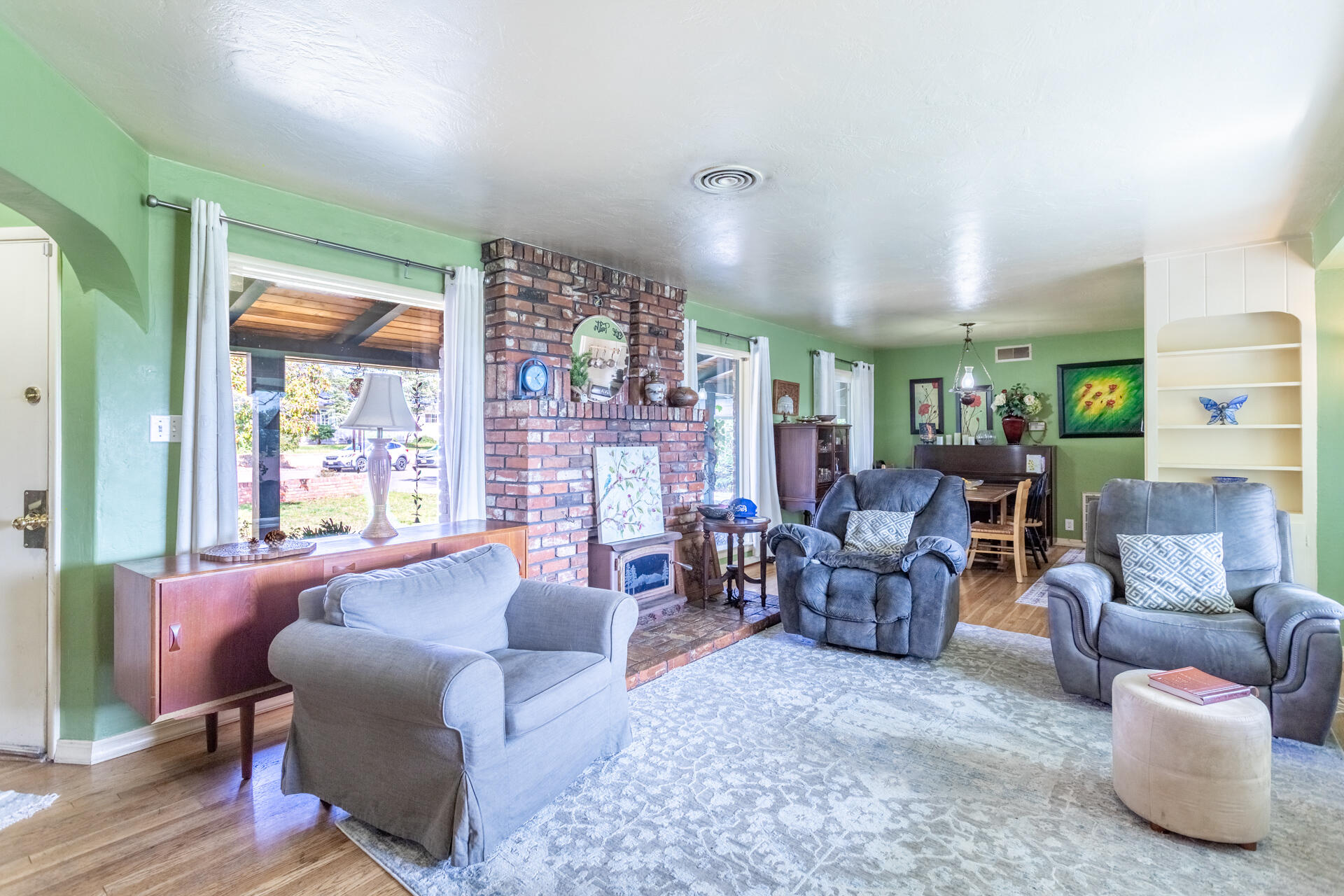 1715 Barbara Road Redding, CA 96003 - Photo 15 of 32 a living room with furniture and a large window