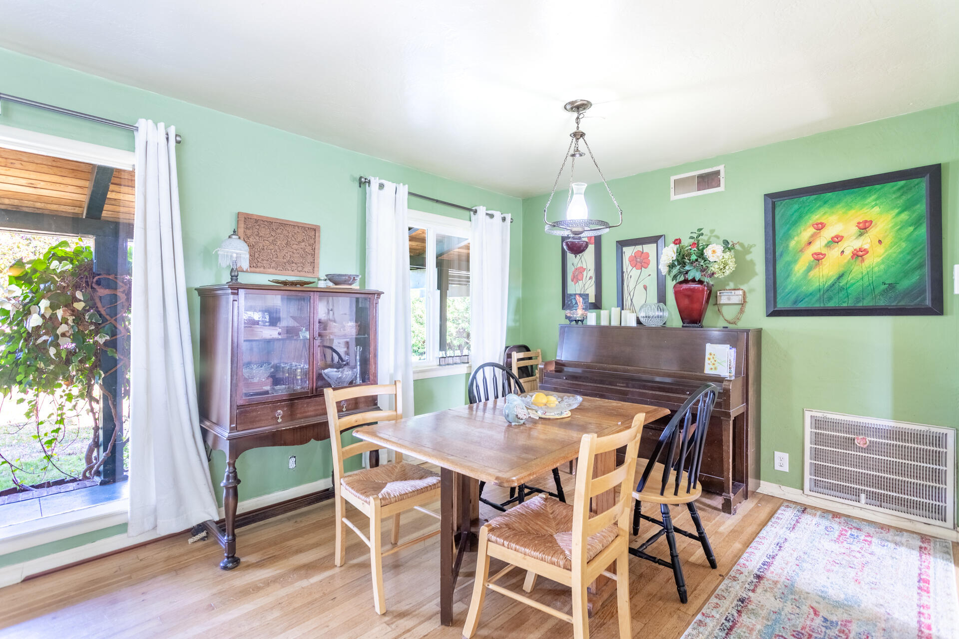 1715 Barbara Road Redding, CA 96003 - Photo 18 of 32 a view of a dining room with furniture window and outside view
