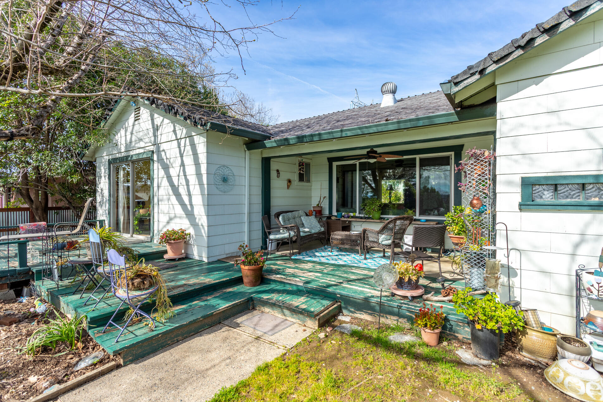 1715 Barbara Road Redding, CA 96003 - Photo 22 of 32 a front view of the house with outdoor seating