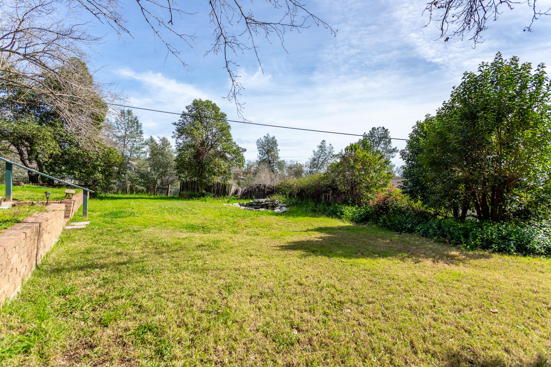 1715 Barbara Road Redding, CA 96003 - Photo 25 of 32 a view of a yard with an outdoor space
