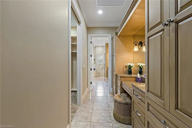 a bathroom with a glass door shower a sink and a mirror