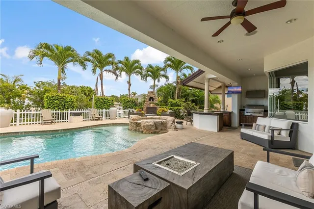 a view of a patio with swimming pool