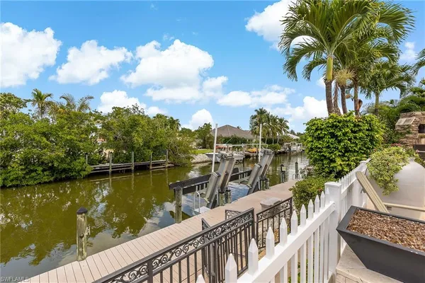 a view of a lake with a houses