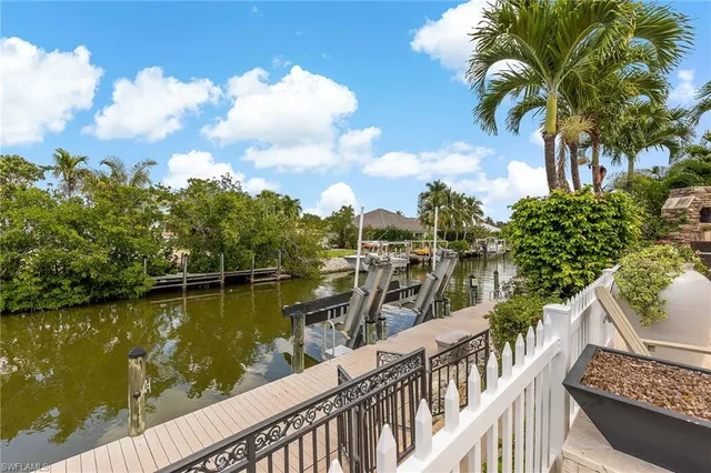 a view of a lake with a houses