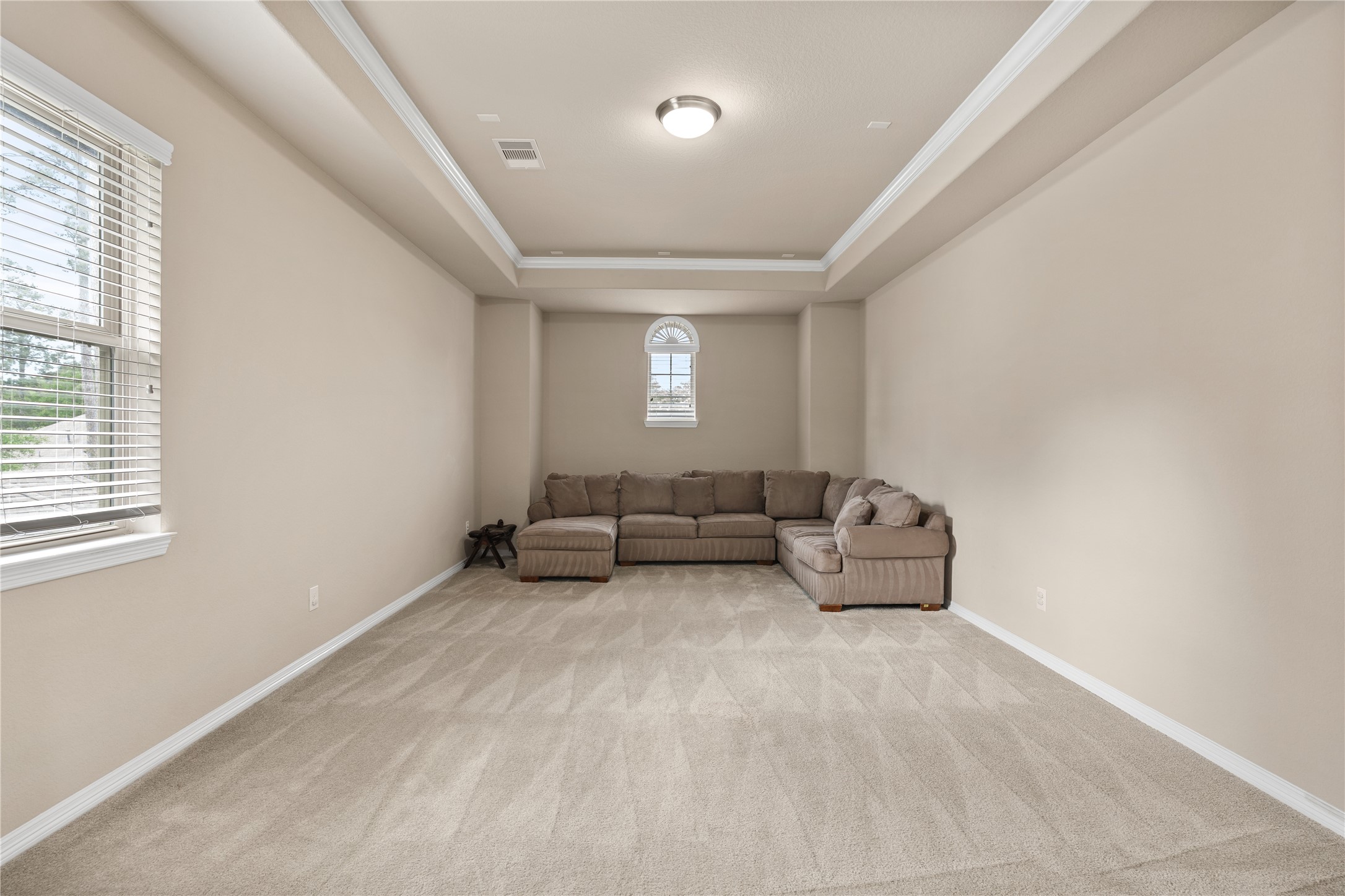 2607 Tree Swallow Bluff Path Spring, TX 77389 - Photo 26 of 44 a living room with furniture and a large window