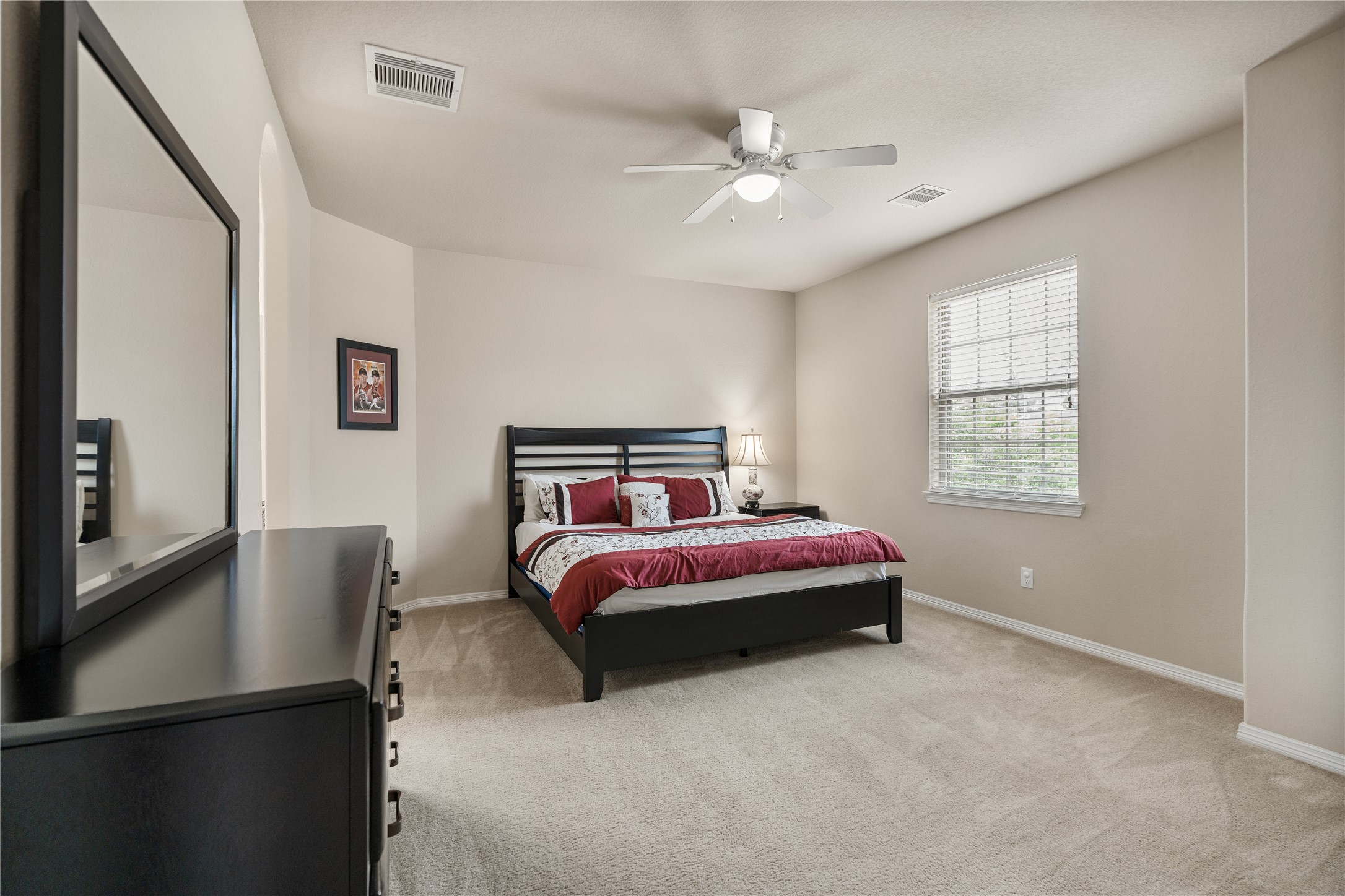 2607 Tree Swallow Bluff Path Spring, TX 77389 - Photo 28 of 44 a bedroom with bed and window