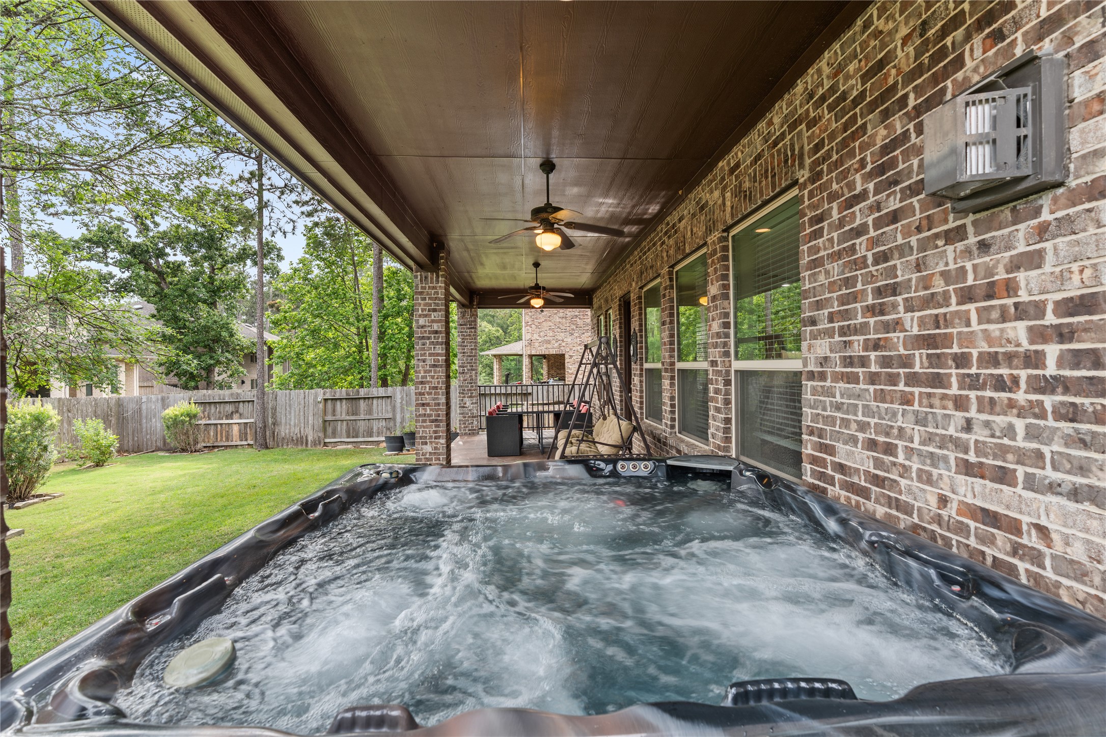 2607 Tree Swallow Bluff Path Spring, TX 77389 - Photo 36 of 44 a view of a backyard with sitting area
