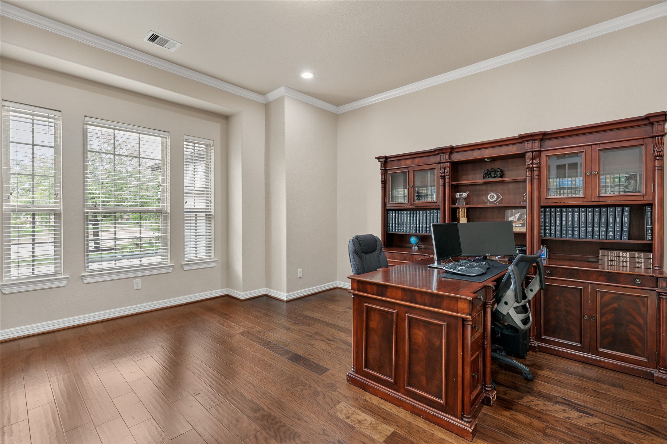 2607 Tree Swallow Bluff Path Spring, TX 77389 - Photo 7 of 44 a work room with furniture wooden floor and a window