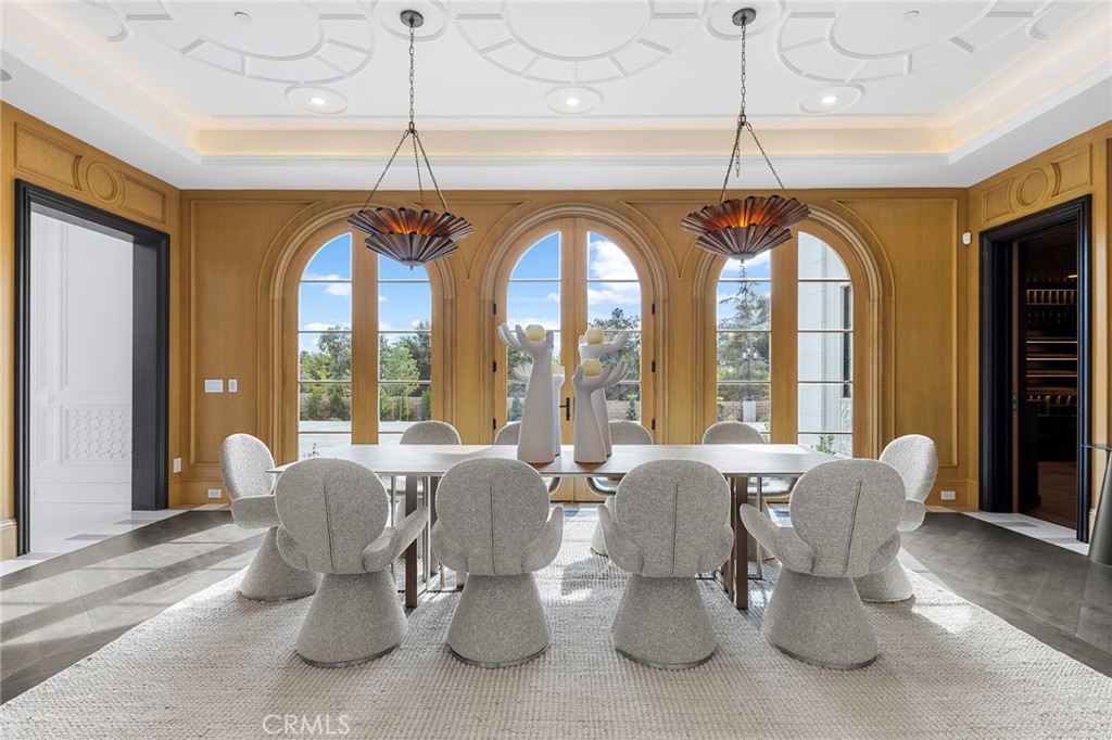 188 Deodar Lane Bradbury, CA 91008 - Photo 12 of 36 a dining room with furniture a chandelier and wooden floor
