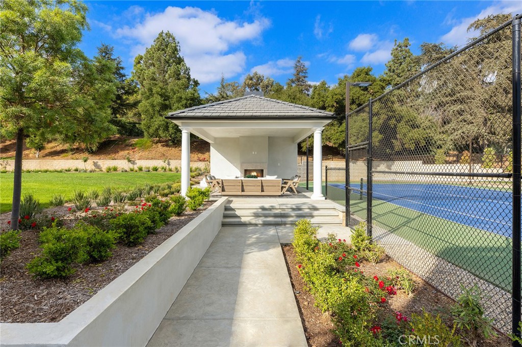 188 Deodar Lane Bradbury, CA 91008 - Photo 28 of 36 a view of a patio with table and chairs and potted plants