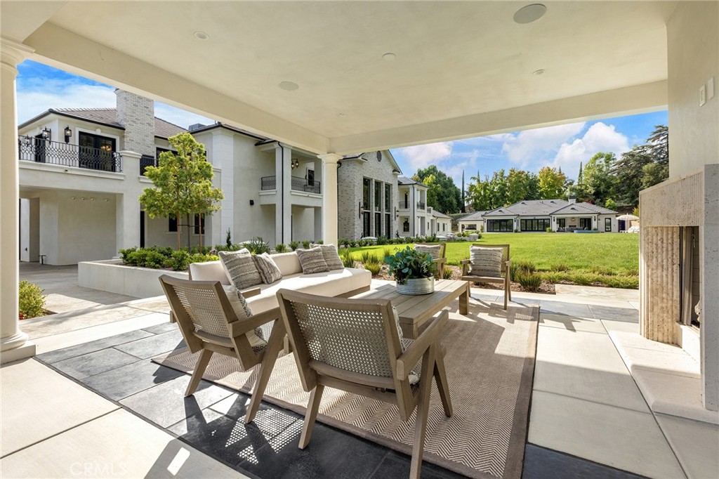 188 Deodar Lane Bradbury, CA 91008 - Photo 30 of 36 a view of a patio with couches table and chairs and potted plants