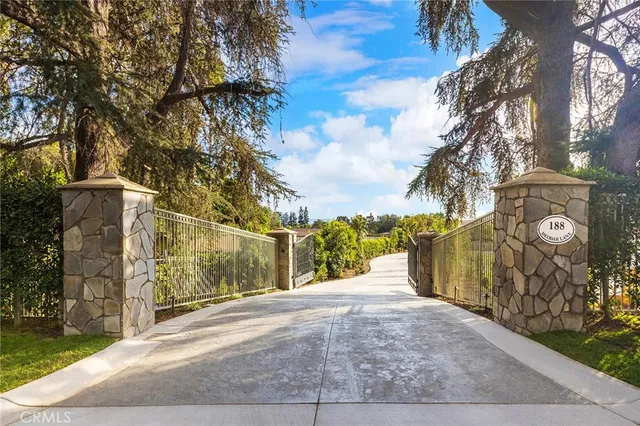 a view of a street with a building in the background