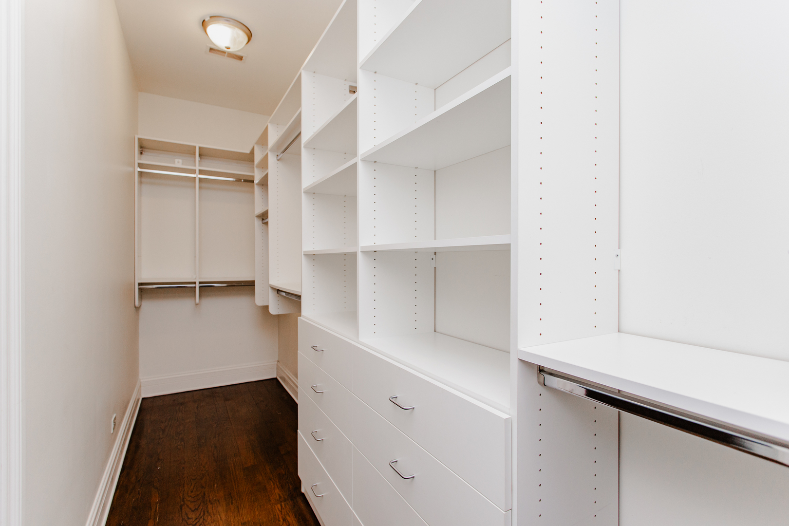 1238 West Jackson Boulevard, Unit 3W Chicago, IL 60607 - Photo 12 of 23 a view of walk in closet with empty racks