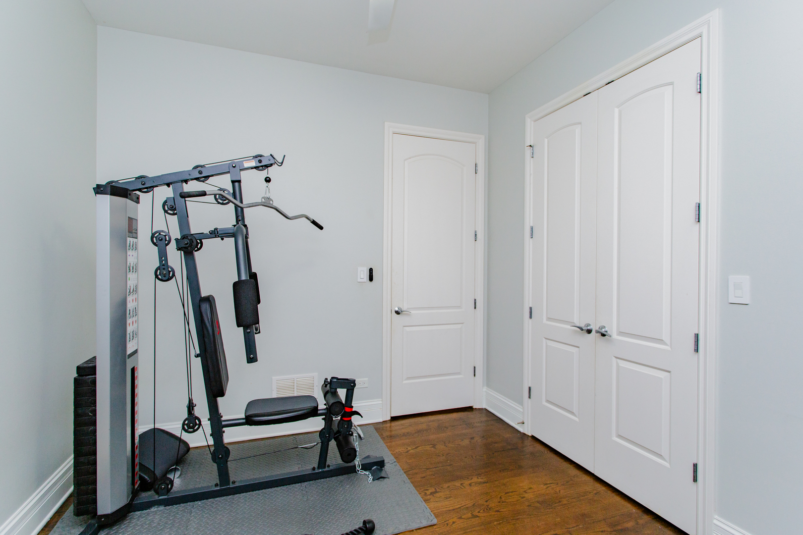 1238 West Jackson Boulevard, Unit 3W Chicago, IL 60607 - Photo 16 of 23 a view of a room with gym equipment