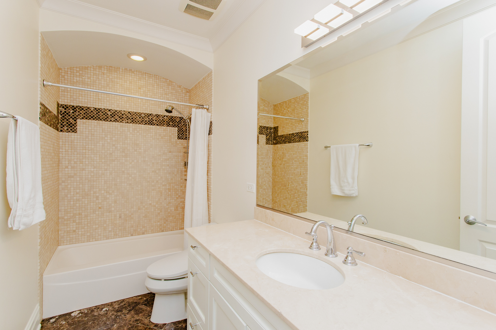 1238 West Jackson Boulevard, Unit 3W Chicago, IL 60607 - Photo 19 of 23 a bathroom with a sink toilet and shower