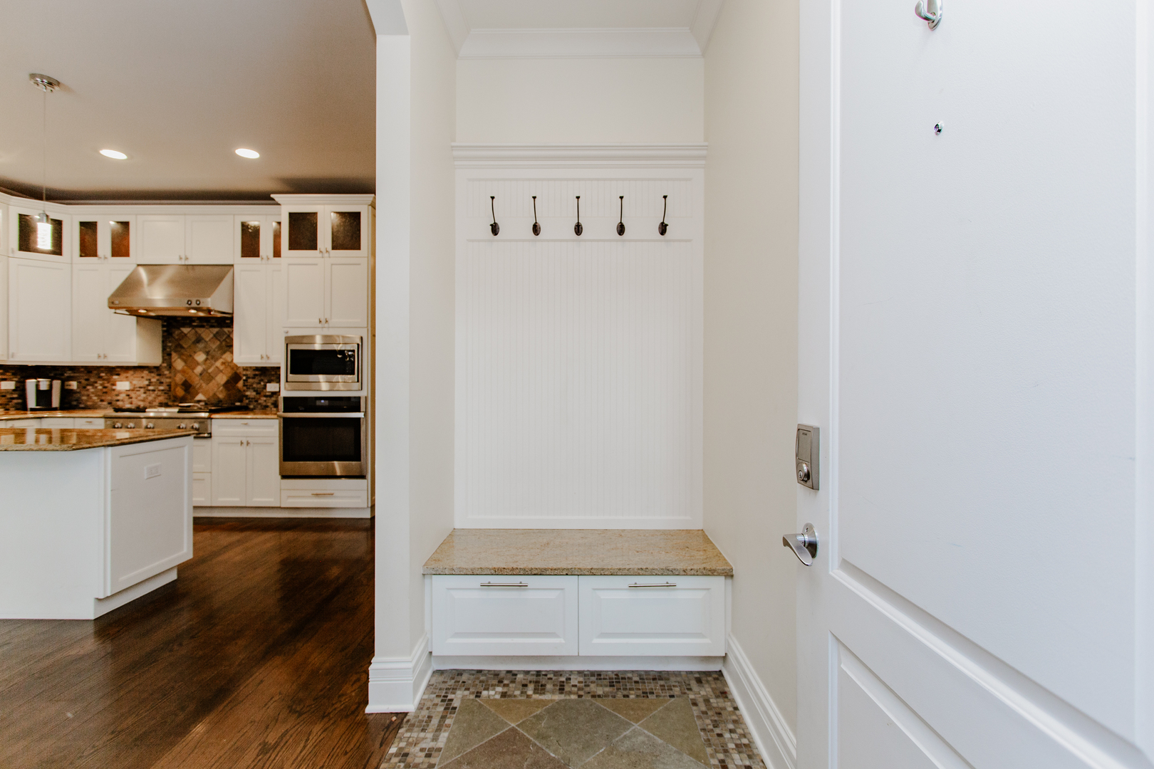 1238 West Jackson Boulevard, Unit 3W Chicago, IL 60607 - Photo 3 of 23 a view of kitchen with wooden floor