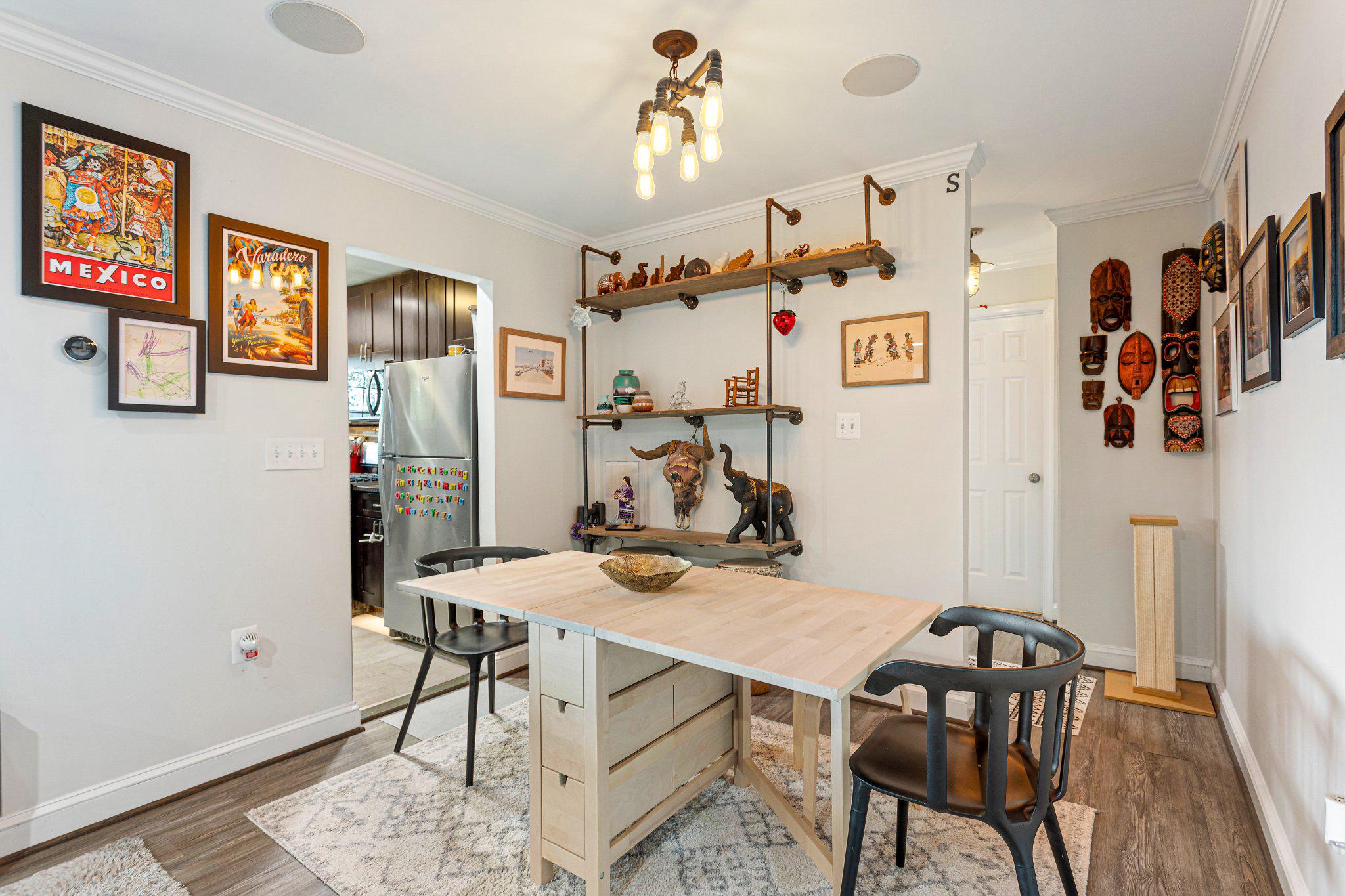5613 Franconia Road, Unit 303 Alexandria, VA 22310 - Photo 15 of 27 a view of a dining room with furniture and a rug