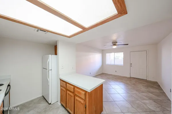 a view of a hallway with a washer and dryer
