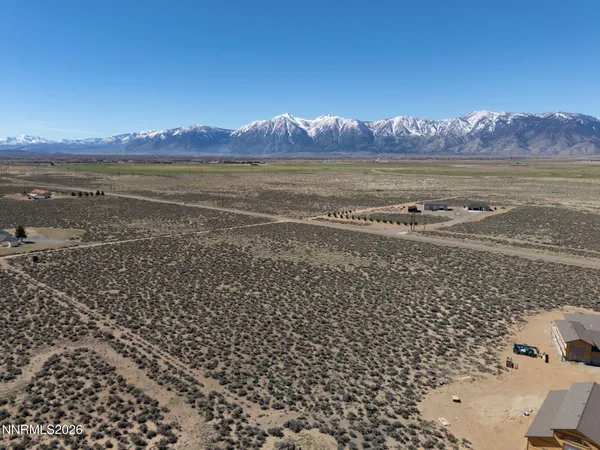 a view of an ocean and a mountain