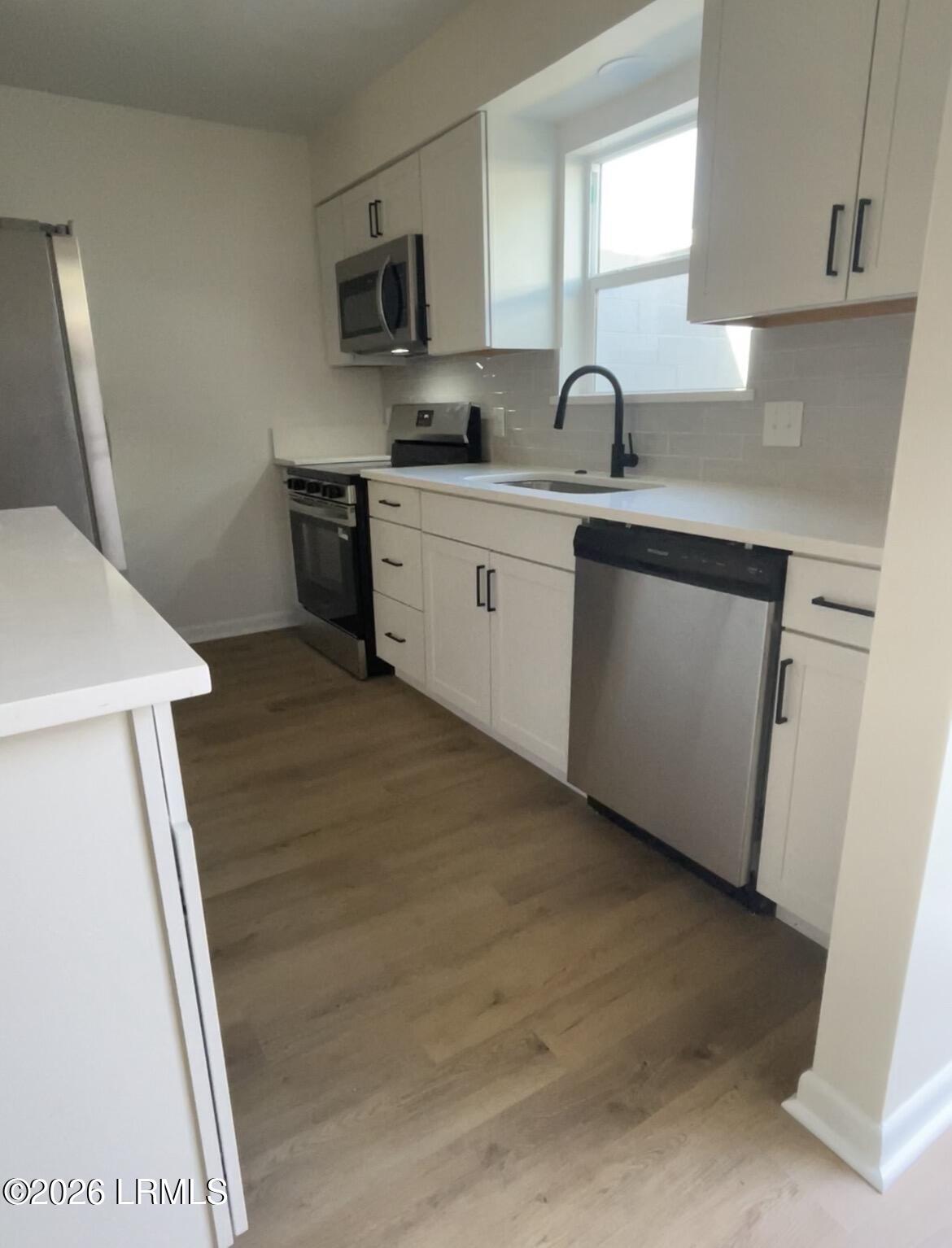 900 State Rd S-7-297, Unit E3 Beaufort, SC 29902 - Photo 4 of 25 IMG_6245