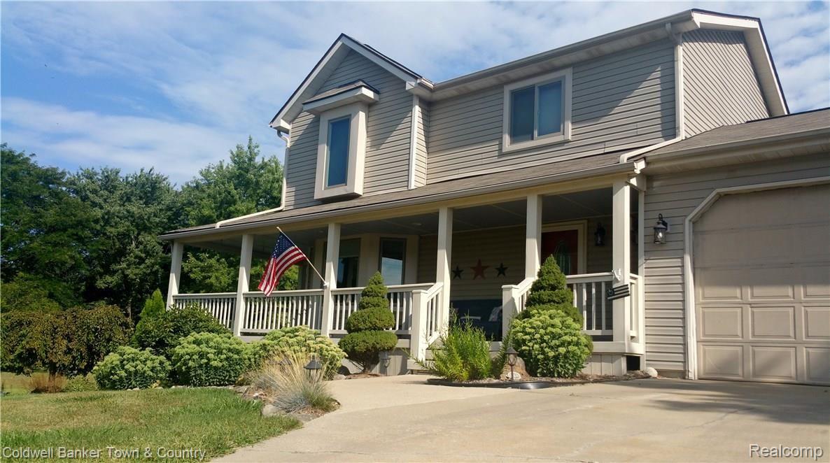 10770 Chase Lake Road Fowlerville, MI 48836 - Photo 5 of 43 ExteriorPorchView.jpg
