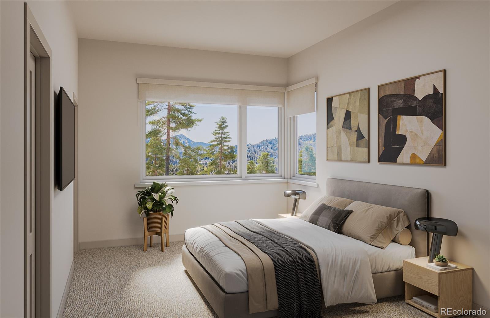 624 Montezuma Road, Unit A1 Keystone, CO 80435 - Photo 2 of 16 a bedroom with a bed and a painting on the wall