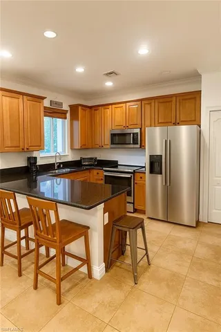 $319,000 | 10220 Olivewood Way, Unit 47, Estero, FL 33928