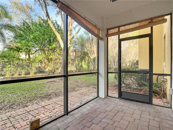 a view of a glass door and the window