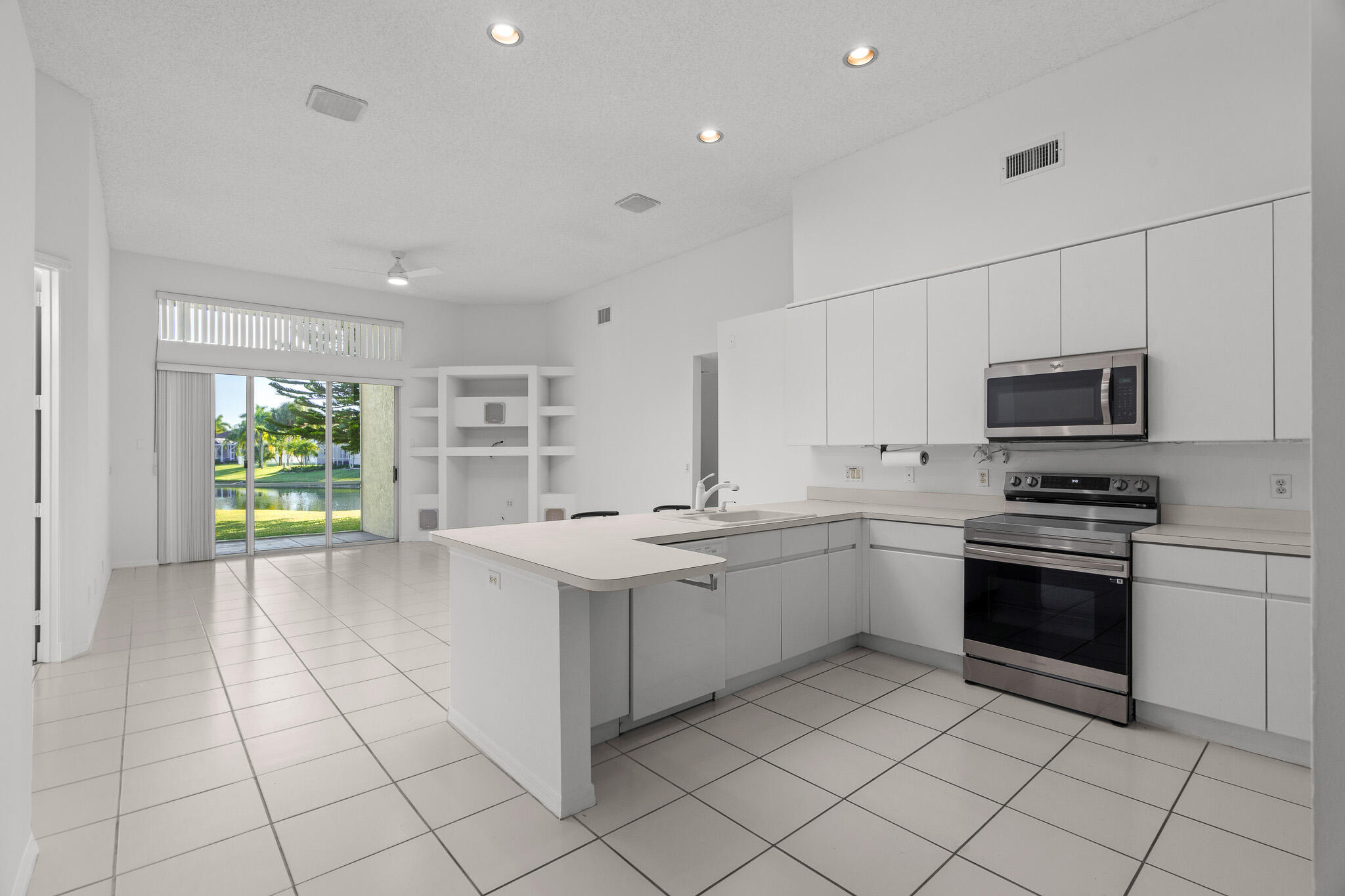 19538 Dinner Key Drive Boca Raton, FL 33498 - Photo 11 of 65 Kitchen & Family Room