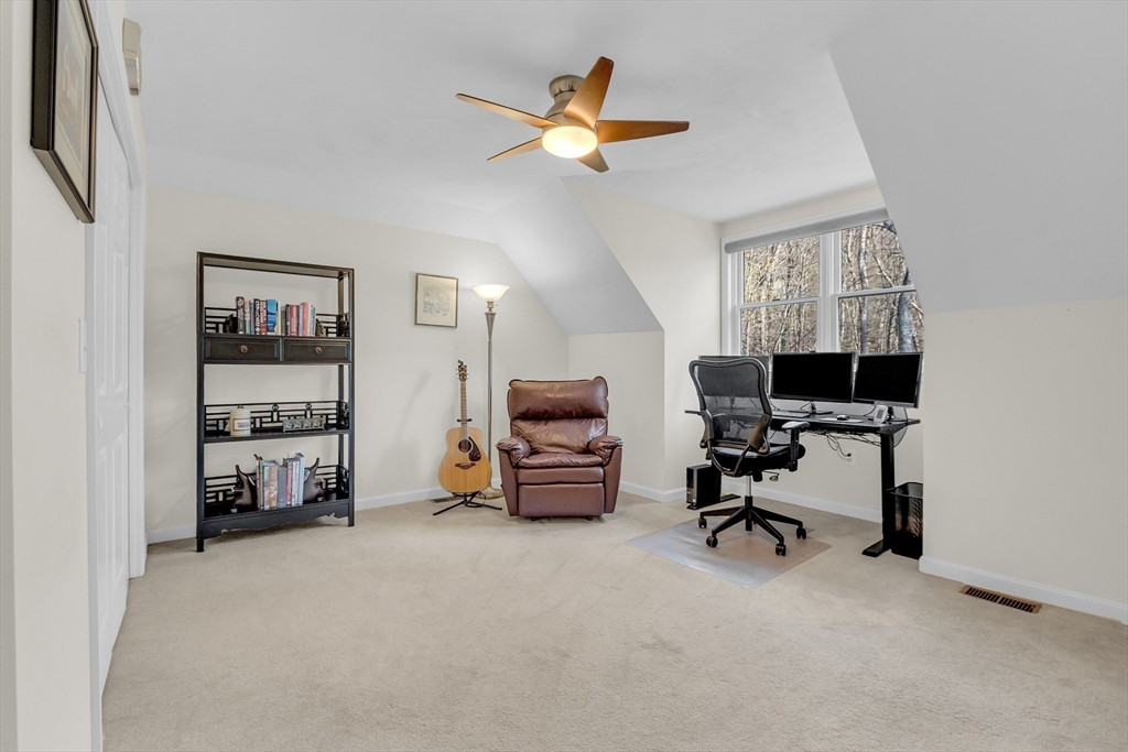 133 Nashaway Road Bolton, MA 01740 - Photo 25 of 42 a view of a livingroom with workspace and a window