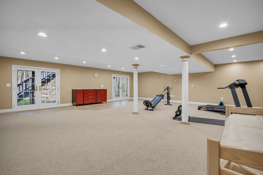 133 Nashaway Road Bolton, MA 01740 - Photo 29 of 42 a view of a room with gym equipment