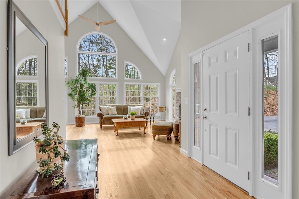 133 Nashaway Road Bolton, MA 01740 - Photo 3 of 42 a living room with furniture and a large window