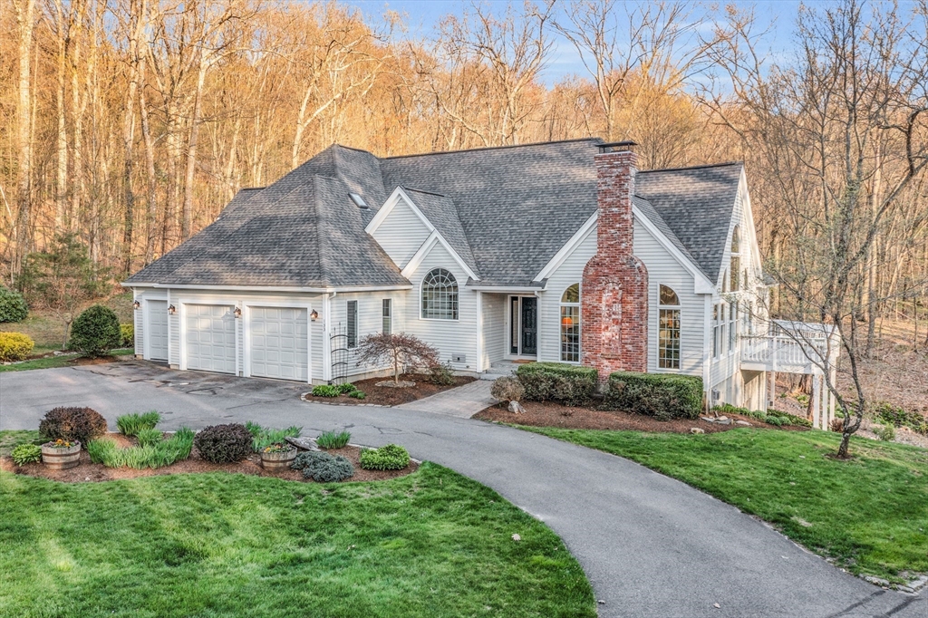 133 Nashaway Road Bolton, MA 01740 - Photo 35 of 42 a view of a house with a yard and pathway
