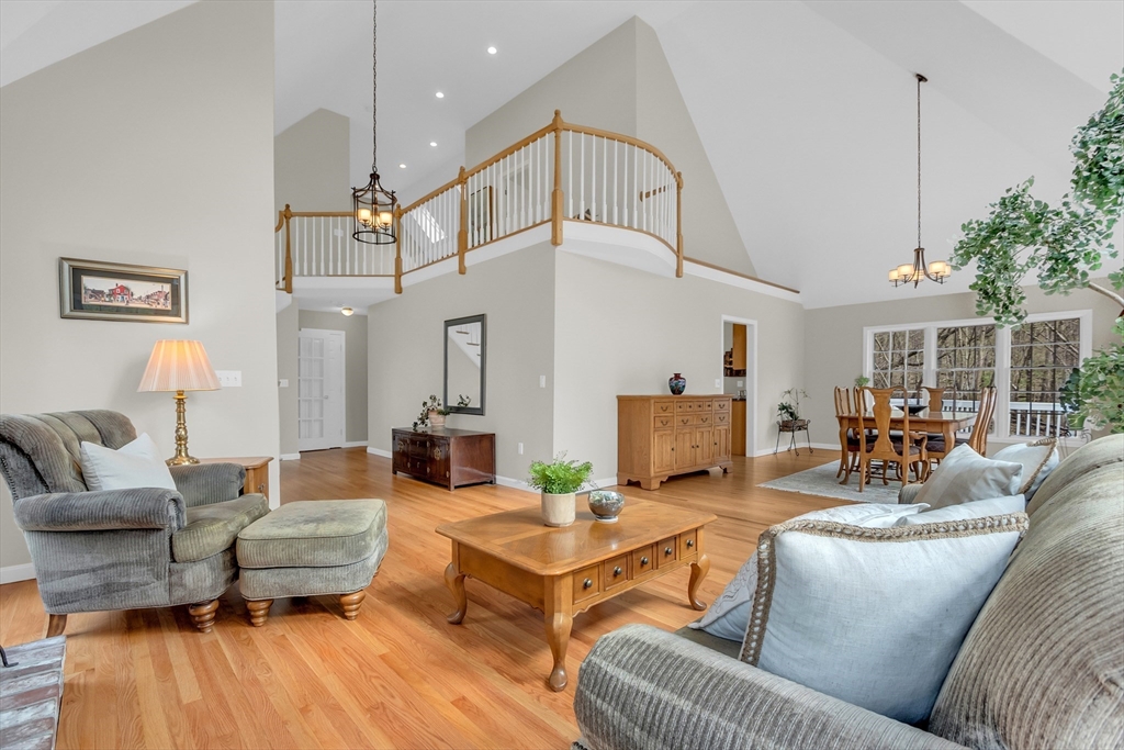 133 Nashaway Road Bolton, MA 01740 - Photo 4 of 42 a living room with furniture and a large window