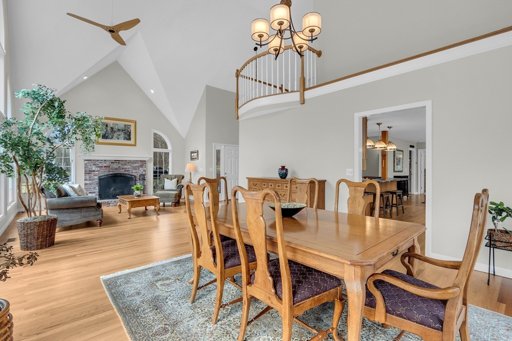 133 Nashaway Road Bolton, MA 01740 - Photo 6 of 42 a view of a dining room with furniture wooden floor and chandelier