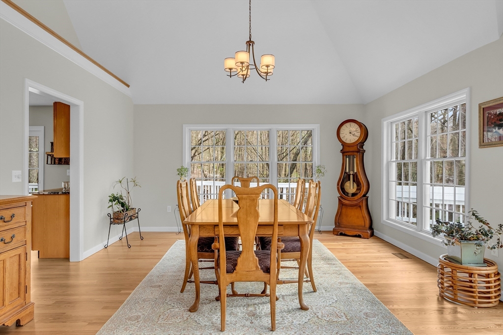 133 Nashaway Road Bolton, MA 01740 - Photo 7 of 42 a view of a dining room with furniture window and wooden floor