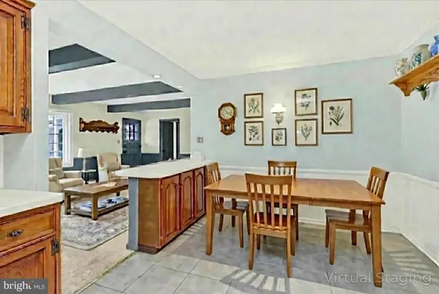 an empty room with furniture and a fireplace