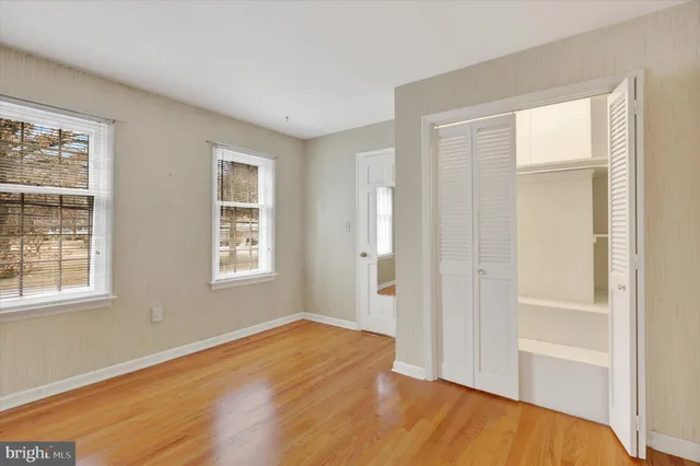 a lobby with furniture and window