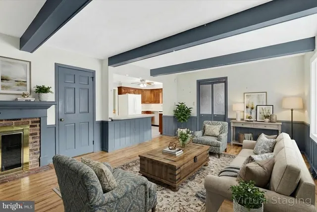 a kitchen with stainless steel appliances granite countertop cabinets and a refrigerator