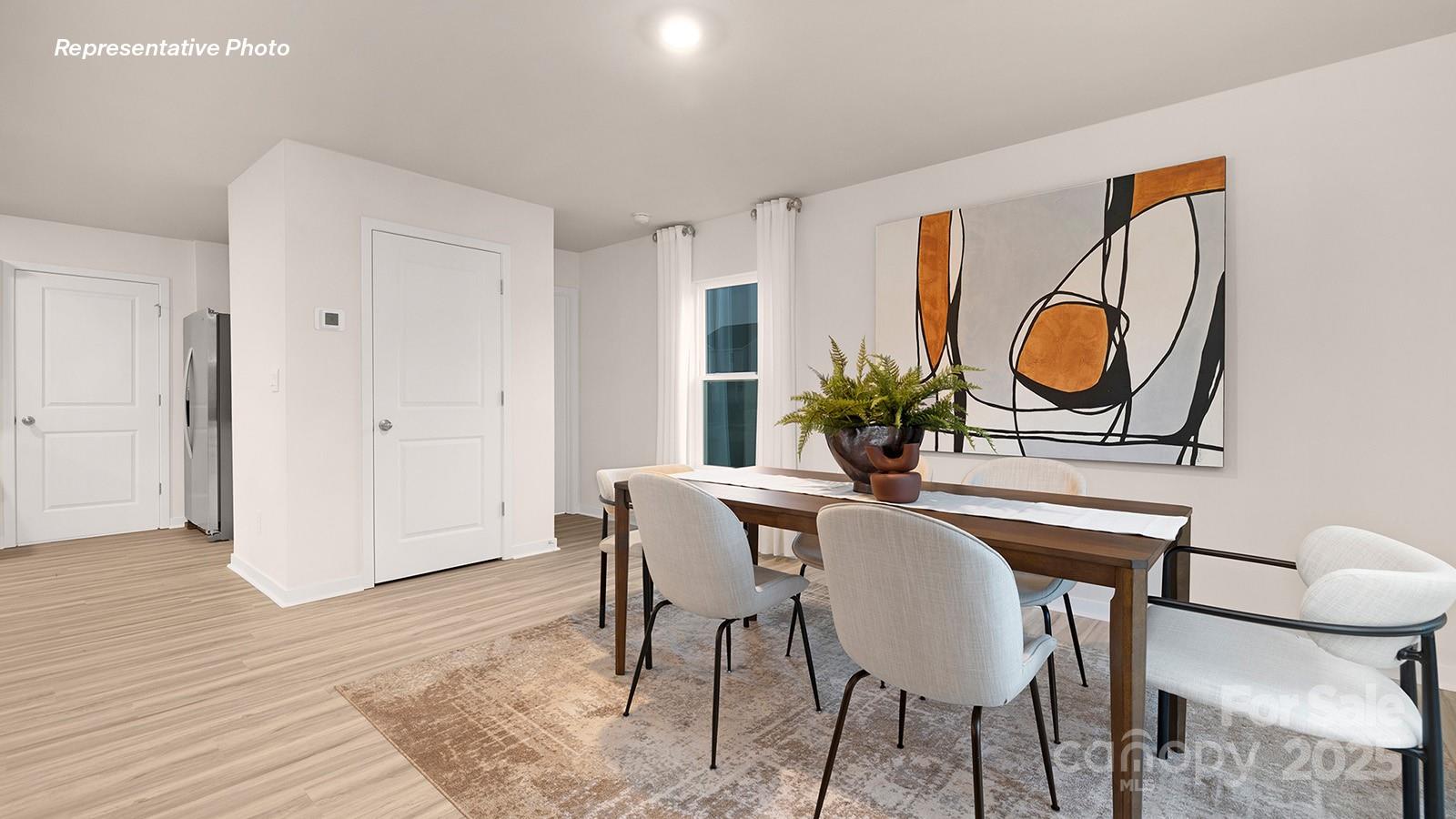 828 North Naughton Street Chester, SC 29706 - Photo 6 of 28 a dining room with furniture and wooden floor