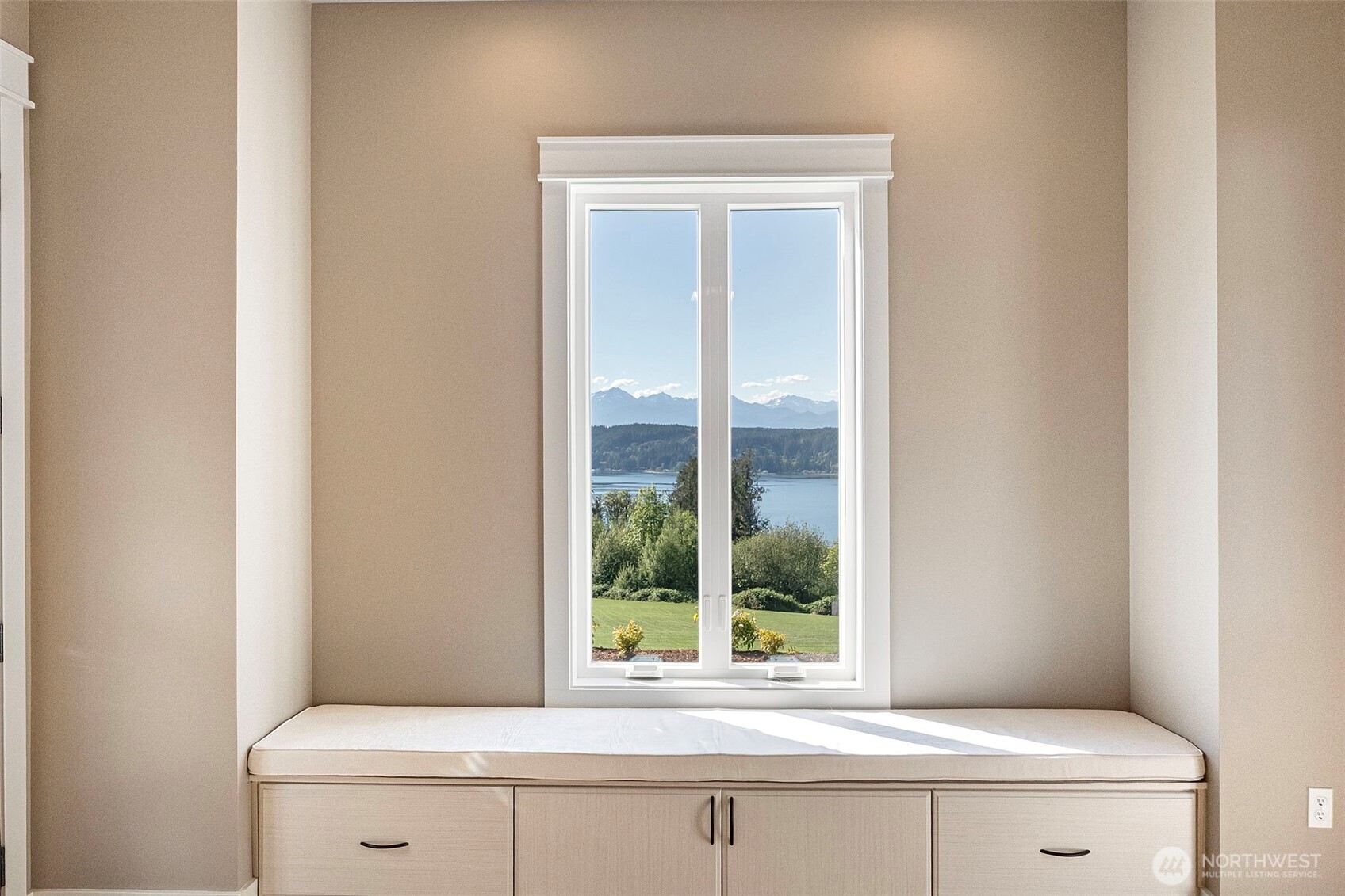151 East Windy Ridge Lane Belfair, WA 98528 - Photo 19 of 40 a bathroom with a window sink and mirror