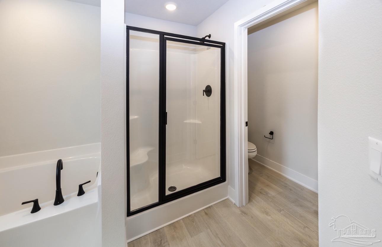 7657 Small Pnes Street Milton, FL 32583 - Photo 17 of 26 a bathroom with a shower and a sink