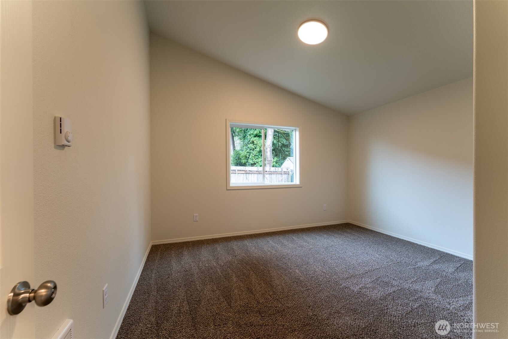 569 North 3rd Kalama, WA 98625 - Photo 11 of 22 an empty room with a window