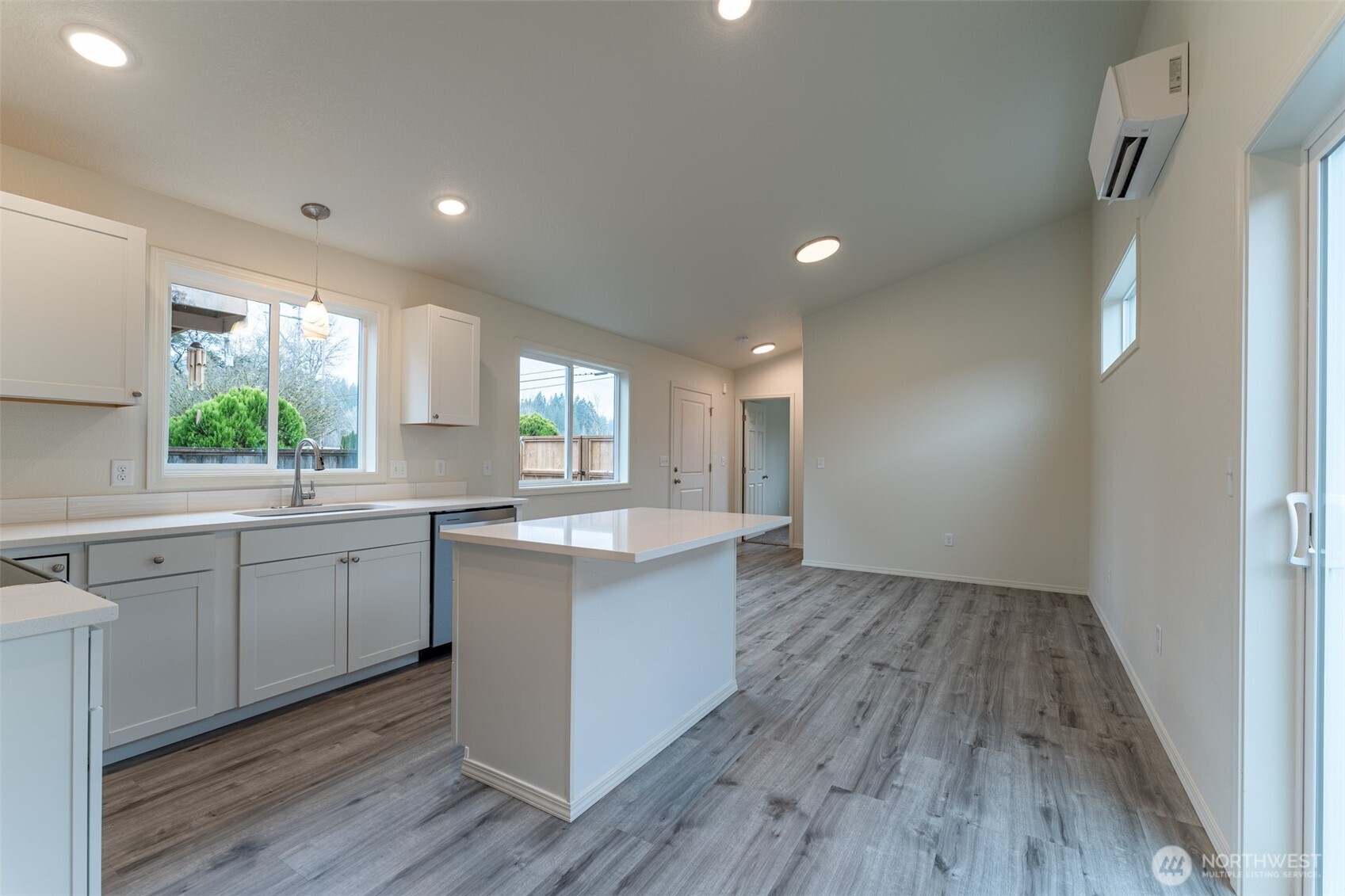 569 North 3rd Kalama, WA 98625 - Photo 14 of 22 a large kitchen with a lot of counter space and wooden floor