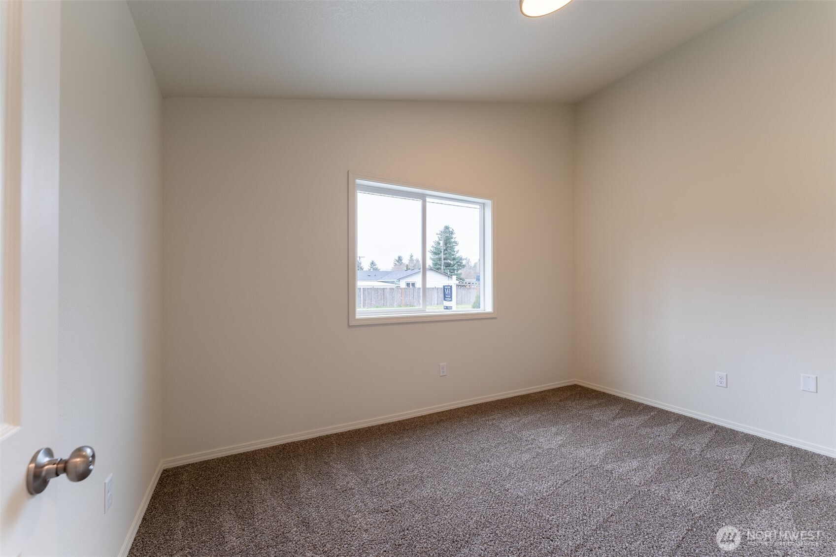 569 North 3rd Kalama, WA 98625 - Photo 15 of 22 an empty room with a window