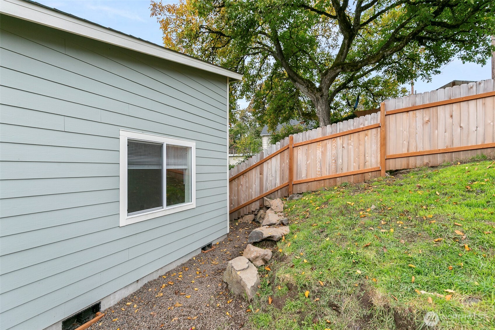 569 North 3rd Kalama, WA 98625 - Photo 18 of 22 a backyard of a house with lots of green space