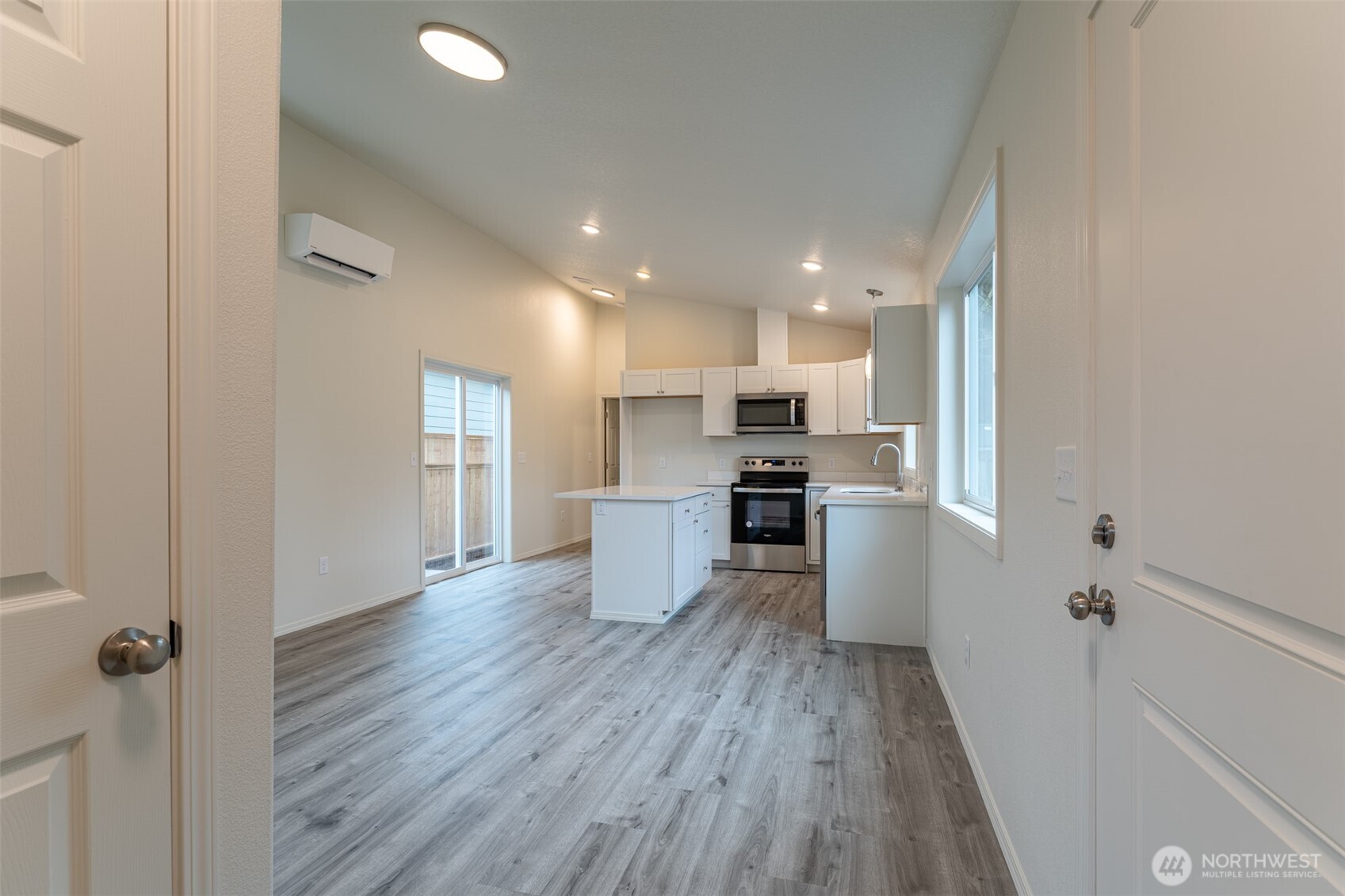 569 North 3rd Kalama, WA 98625 - Photo 7 of 22 a kitchen with a refrigerator and a stove top oven