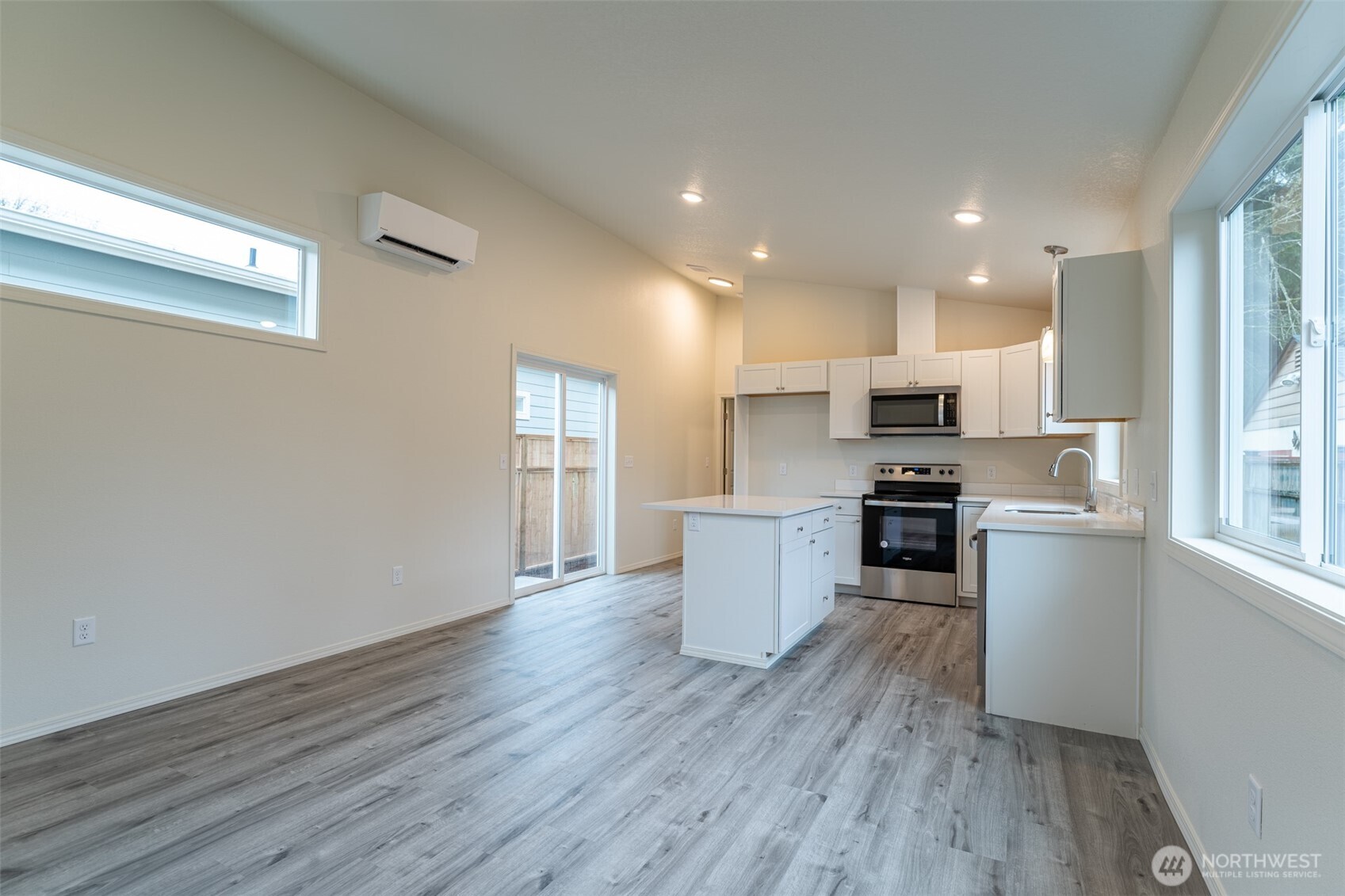 569 North 3rd Kalama, WA 98625 - Photo 8 of 22 a kitchen with a refrigerator and a stove top oven