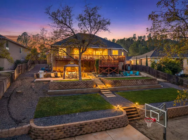 a view of a swimming pool with a yard